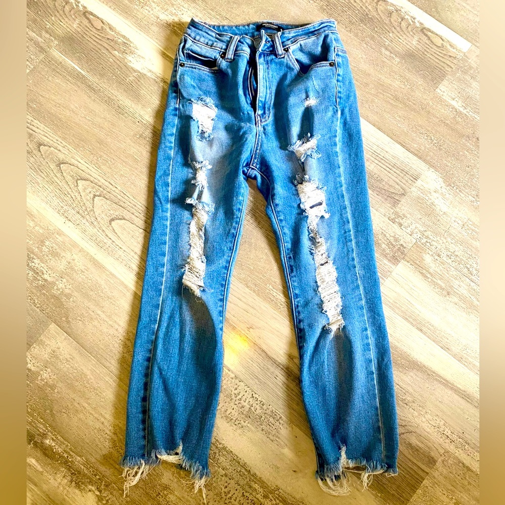 Cropped distressed skinny jeans